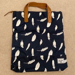 Herschel blue feather and polka dot flat tote bag